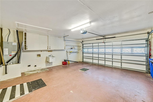 2607 Lancaster Dr Unit 35, Sun City Center, FL 33573 - garage with a garage door opener and heating unit