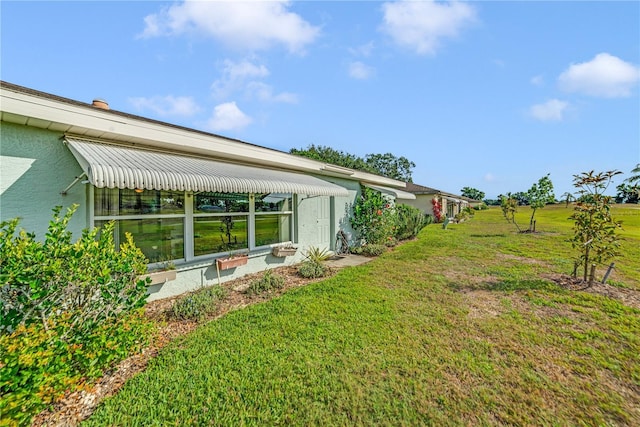2607 Lancaster Dr Unit 35, Sun City Center, FL 33573 - view of grassy yard