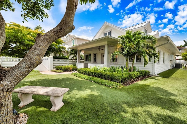 1841 Datura St, Sarasota, FL 34239 - rear view of house featuring a ceiling fan, a standing seam roof, metal roof, and central air condition unit