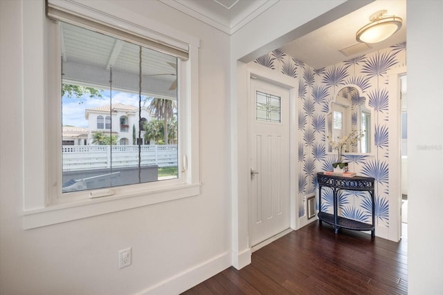 1841 Datura St, Sarasota, FL 34239 - foyer featuring baseboards, dark wood finished floors, and wallpapered walls