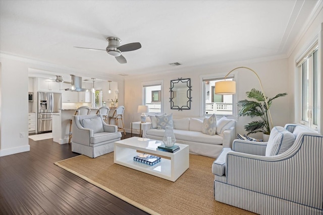 1841 Datura St, Sarasota, FL 34239 - living room featuring a ceiling fan, dark wood finished floors, crown molding, and baseboards