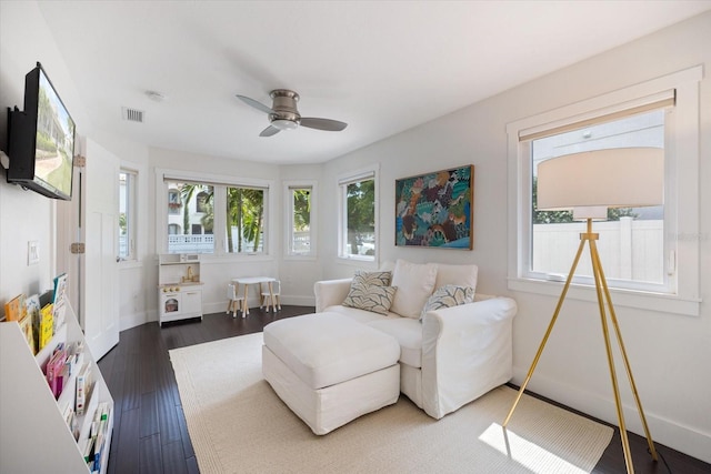1841 Datura St, Sarasota, FL 34239 - living area featuring ceiling fan, baseboards, and wood finished floors