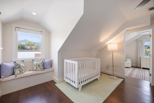 1841 Datura St, Sarasota, FL 34239 - bedroom with vaulted ceiling and hardwood / wood-style floors
