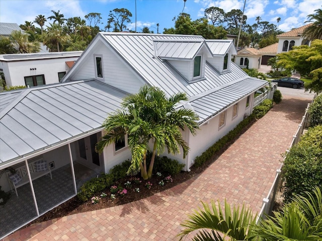 1841 Datura St, Sarasota, FL 34239 - view of property exterior with a standing seam roof and metal roof