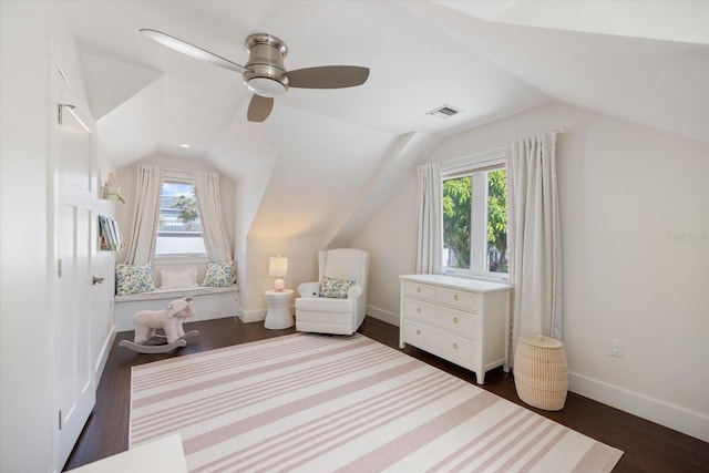 1841 Datura St, Sarasota, FL 34239 - living area with vaulted ceiling, dark wood-style flooring, ceiling fan, and baseboards