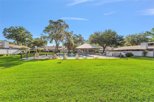 view of yard featuring a community pool