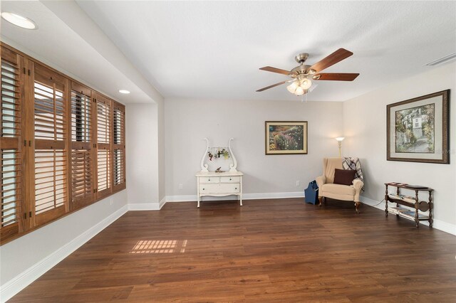 living area featuring ceiling fan, wood finished floors, baseboards, and recessed lighting
