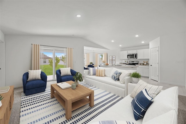 living area with healthy amount of natural light, lofted ceiling, recessed lighting, baseboards, and light colored carpet