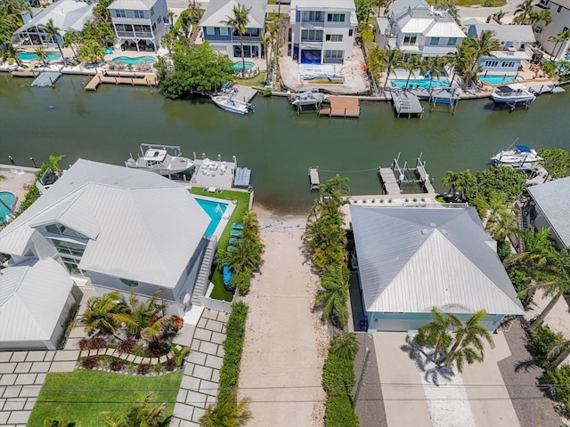229 S Harbor Dr, Holmes Beach, FL 34217 - aerial view of residential area featuring a nearby body of water and a pool