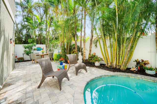 229 S Harbor Dr, Holmes Beach, FL 34217 - view of pool featuring a fenced backyard and a patio area