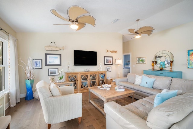 229 S Harbor Dr, Holmes Beach, FL 34217 - living area featuring a ceiling fan, wood finished floors, lofted ceiling, and baseboards