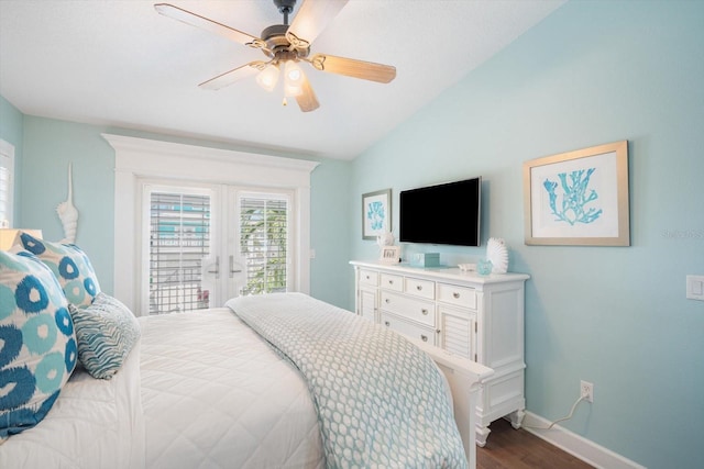 229 S Harbor Dr, Holmes Beach, FL 34217 - bedroom with dark wood-style floors, vaulted ceiling, access to outside, baseboards, and a ceiling fan
