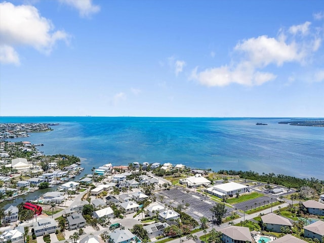 229 S Harbor Dr, Holmes Beach, FL 34217 - aerial perspective of suburban area with a large body of water