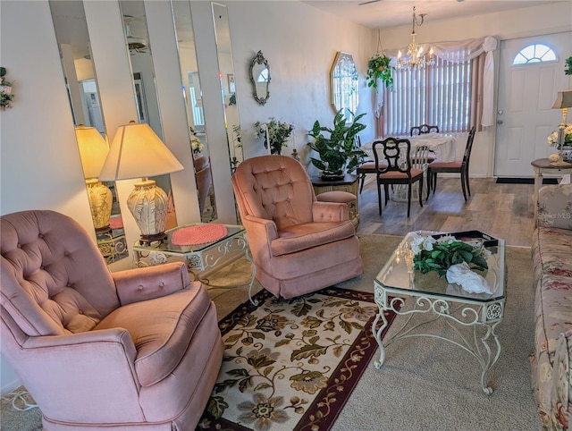 5895 17th St W Unit B-26, Bradenton, FL 34207 - living room featuring a chandelier and wood finished floors