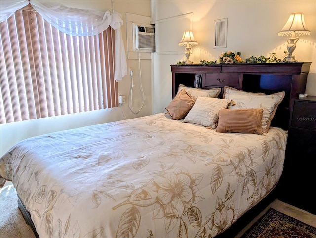 5895 17th St W Unit B-26, Bradenton, FL 34207 - bedroom with carpet and a wall mounted AC