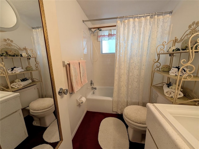 5895 17th St W Unit B-26, Bradenton, FL 34207 - full bathroom featuring toilet, vanity, and shower / bathtub combination with curtain