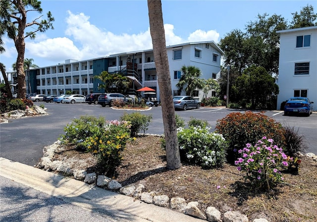 5895 17th St W Unit B-26, Bradenton, FL 34207 - view of building exterior featuring uncovered parking