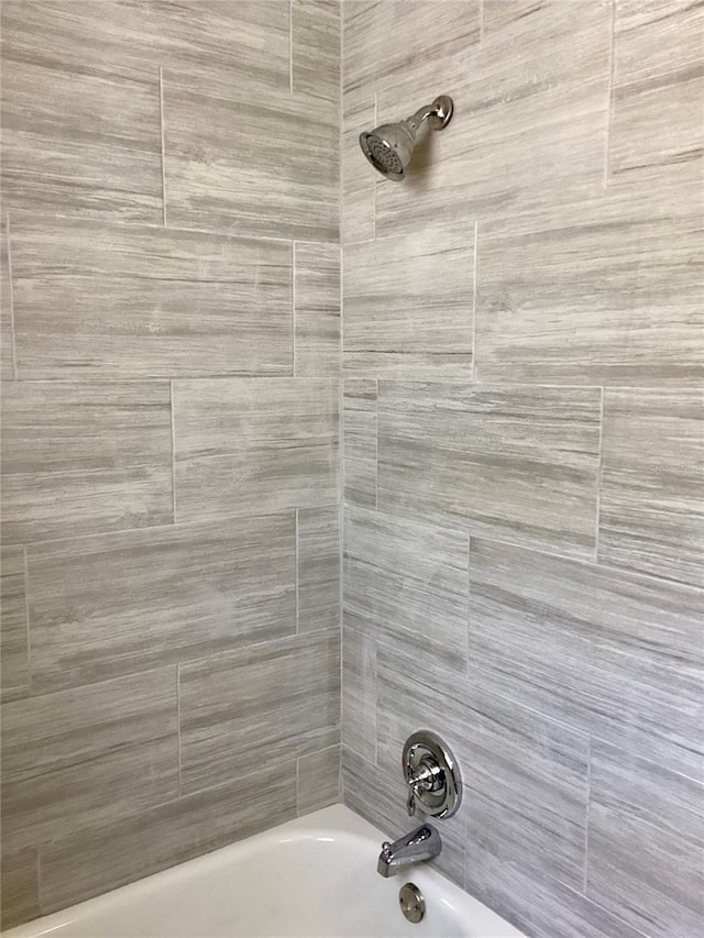 bathroom featuring bathtub / shower combination