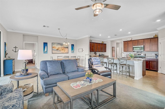 20542 Trattoria Loop, Venice, FL 34293 - living area with recessed lighting, ceiling fan, crown molding, light tile patterned flooring, and baseboards