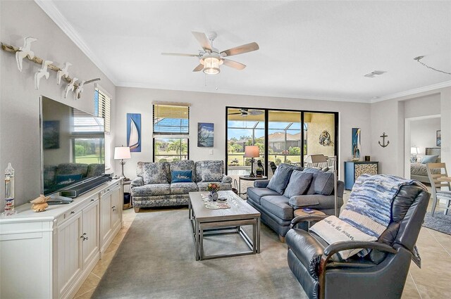 20542 Trattoria Loop, Venice, FL 34293 - living room featuring a ceiling fan, light tile patterned flooring, and ornamental molding
