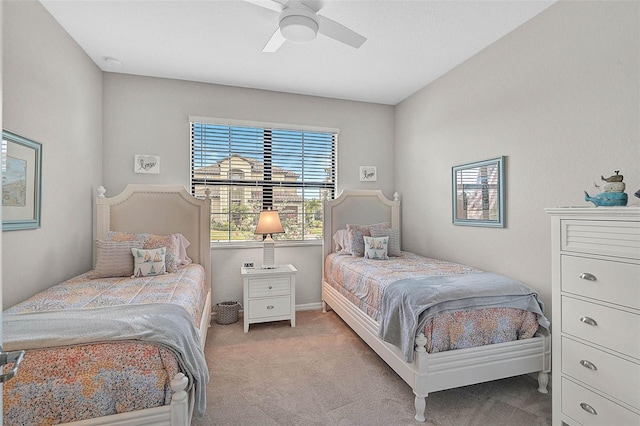 20542 Trattoria Loop, Venice, FL 34293 - bedroom featuring light colored carpet, a ceiling fan, and baseboards