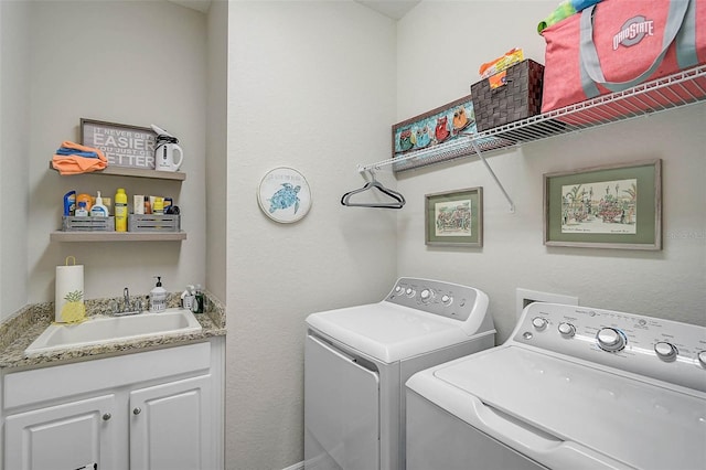 20542 Trattoria Loop, Venice, FL 34293 - clothes washing area featuring washer and dryer and cabinet space