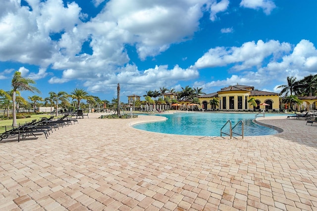 20542 Trattoria Loop, Venice, FL 34293 - community pool with a patio, fence, and french doors