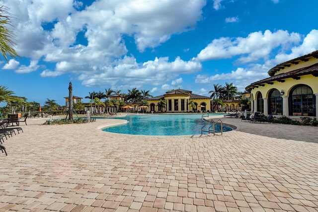 20542 Trattoria Loop, Venice, FL 34293 - community pool featuring a patio