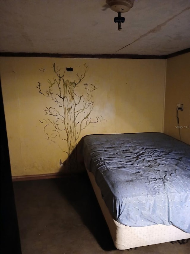 bedroom with ornamental molding