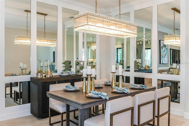 dining space with crown molding and a chandelier