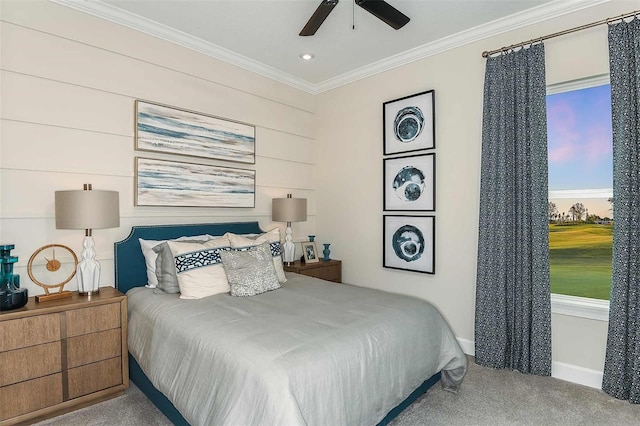 carpeted bedroom with ornamental molding, recessed lighting, baseboards, and ceiling fan