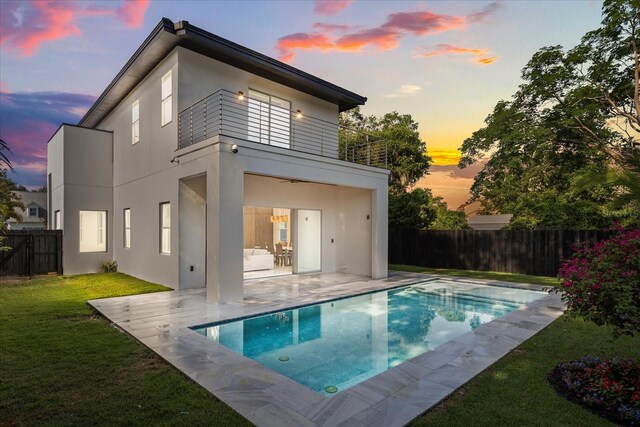 1521 Chestnut Ave, Winter Park, FL 32789 - rear view of house with a patio and stucco siding