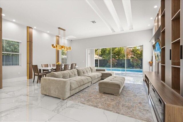 1521 Chestnut Ave, Winter Park, FL 32789 - living area featuring plenty of natural light, recessed lighting, and marble tiled floors