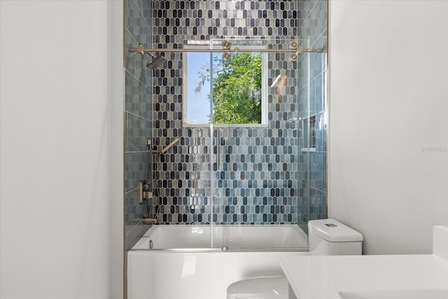 1521 Chestnut Ave, Winter Park, FL 32789 - bathroom featuring toilet, bathing tub / shower combination, and vanity