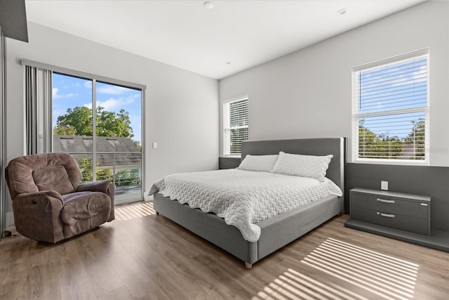 1521 Chestnut Ave, Winter Park, FL 32789 - bedroom featuring access to exterior and light wood-style flooring