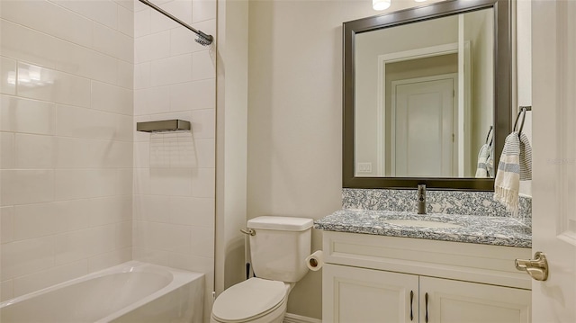 bathroom featuring vanity, toilet, and shower / bath combination