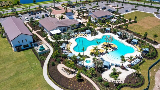 drone / aerial view of a pool