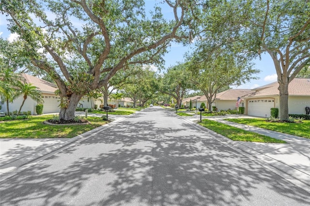 3263 Woodberry Ln Lot 15, Sarasota, FL 34231 - view of asphalt street with a residential view, curbs, and sidewalks