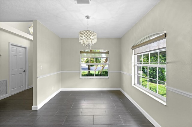 3263 Woodberry Ln Lot 15, Sarasota, FL 34231 - unfurnished dining area with a chandelier and baseboards