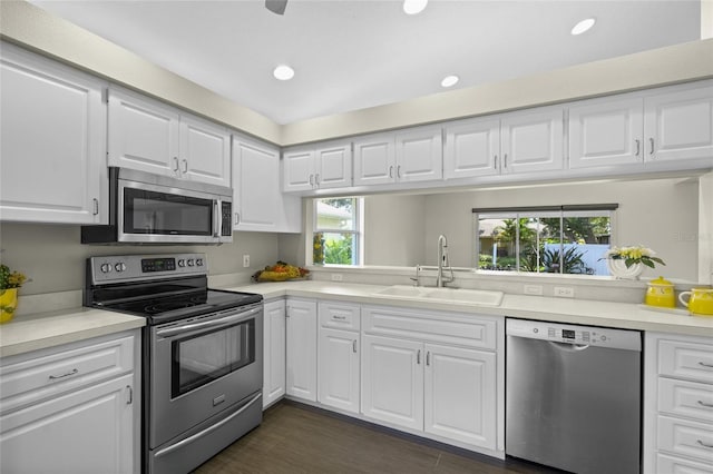 3263 Woodberry Ln Lot 15, Sarasota, FL 34231 - kitchen with appliances with stainless steel finishes, a sink, light countertops, white cabinetry, and recessed lighting