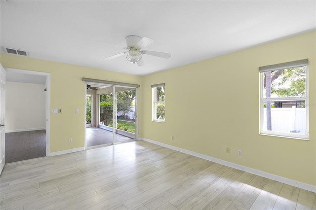 3263 Woodberry Ln Lot 15, Sarasota, FL 34231 - spare room with a ceiling fan, baseboards, and light wood finished floors