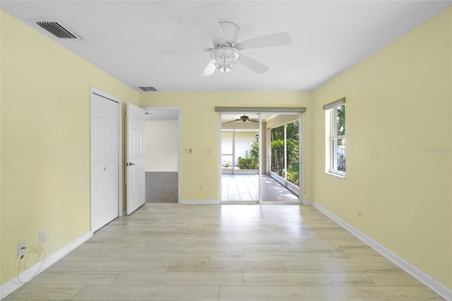 3263 Woodberry Ln Lot 15, Sarasota, FL 34231 - spare room with a ceiling fan, light wood finished floors, and baseboards