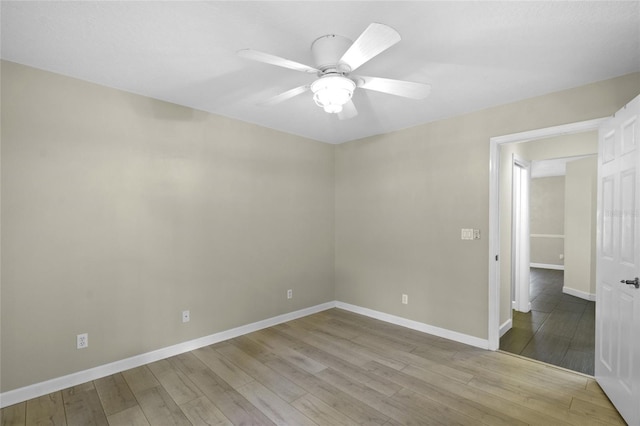 3263 Woodberry Ln Lot 15, Sarasota, FL 34231 - empty room featuring ceiling fan, wood finished floors, and baseboards