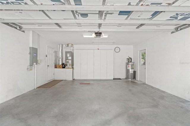 3263 Woodberry Ln Lot 15, Sarasota, FL 34231 - garage with a garage door opener, electric panel, electric water heater, and heating unit