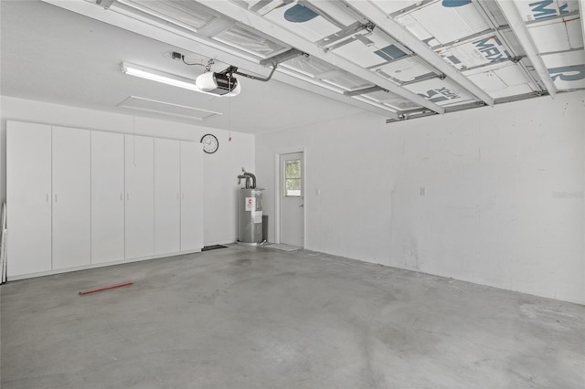 3263 Woodberry Ln Lot 15, Sarasota, FL 34231 - garage with water heater and a garage door opener