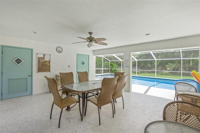 3263 Woodberry Ln Lot 15, Sarasota, FL 34231 - dining area featuring a sunroom, a ceiling fan, and speckled floor