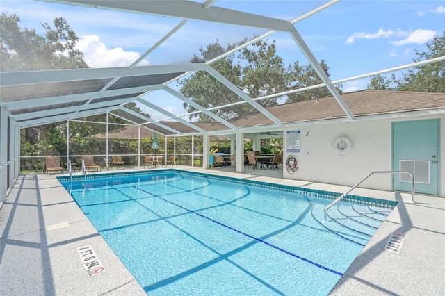 3263 Woodberry Ln Lot 15, Sarasota, FL 34231 - view of swimming pool featuring a patio area and glass enclosure