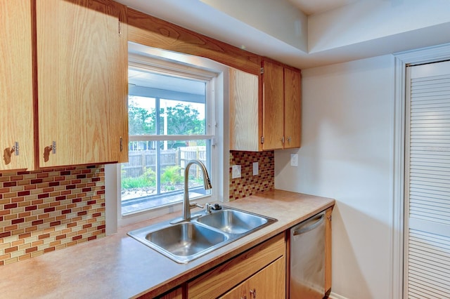 7719 9th Avenue Dr NW, Bradenton, FL 34209 - kitchen with a sink, backsplash, light countertops, and dishwasher