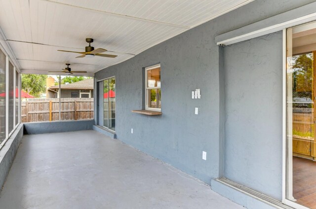 7719 9th Avenue Dr NW, Bradenton, FL 34209 - unfurnished sunroom featuring a ceiling fan