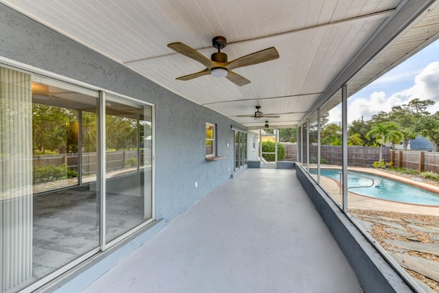 7719 9th Avenue Dr NW, Bradenton, FL 34209 - fenced backyard with ceiling fan and a patio